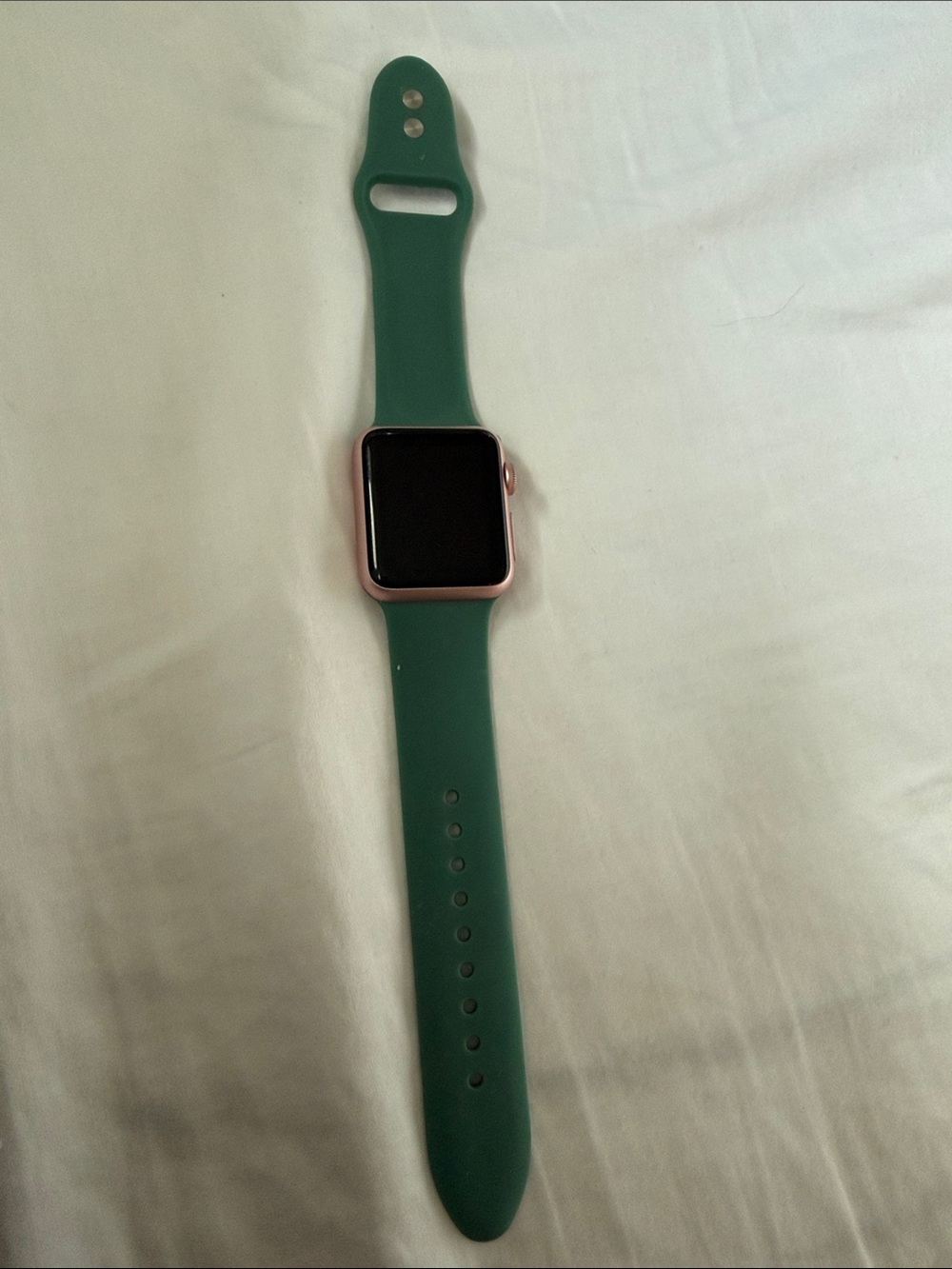Apple Watch with Emerald Green Sport Band and Rose Gold Case